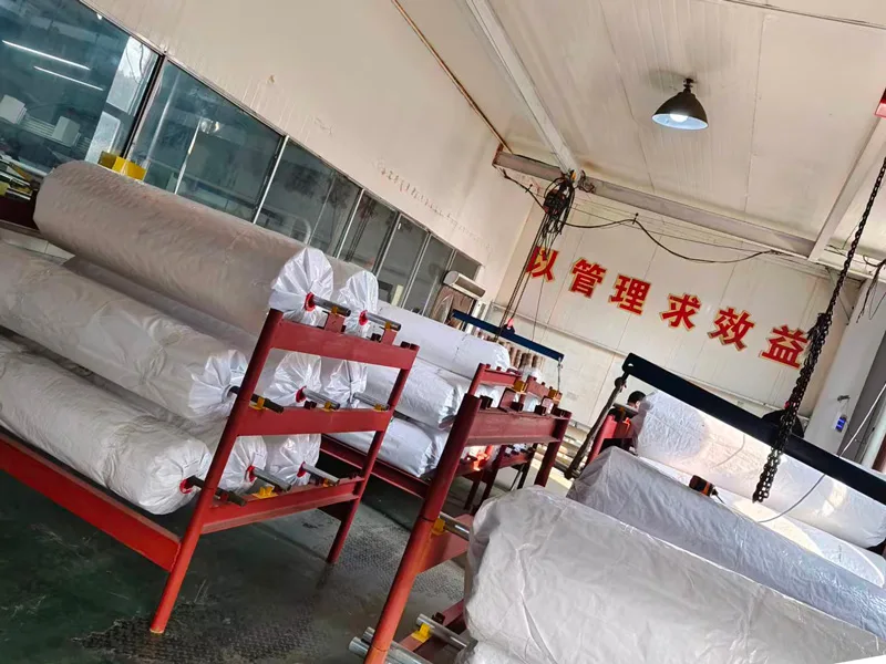 cellulose film jumbo rolls are placed in a controlled storage environment.